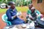 Salome Adongo, a community health promoter, test Caroline Atieno's daughter for malaria after detecting a fever during a routine household visit (c) Amref Health Africa/Kennedy Musyoka
