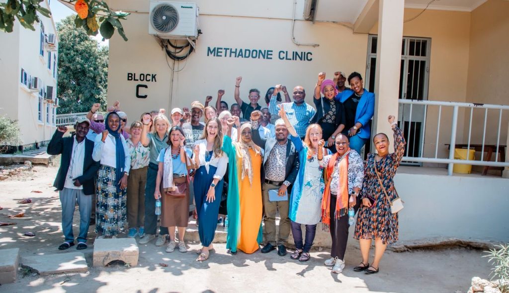 Amref UK and Tanzania staff, with Mbele Movement members at a clinic in Zanzibar. (c) Amref Health Africa